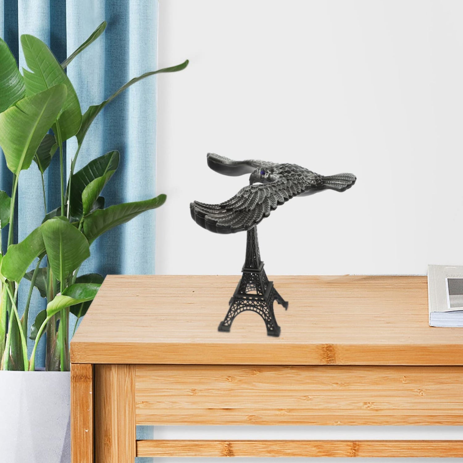 Balancing Bird on Eiffel Tower Base Balancing Bird on Eiffel Tower Base
